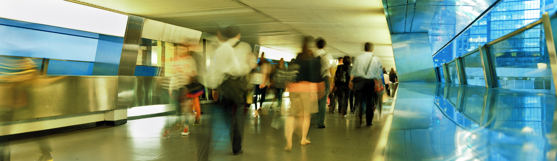 blured image of people walking in an airport